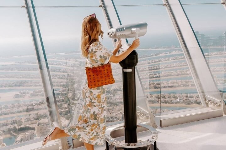 Experience breathtaking views from The View at The Palm where the stunning landscapes of Palm Jumeirah and the Dubai skyline unfold before your eyes. A perfect spot for unforgettable memories.